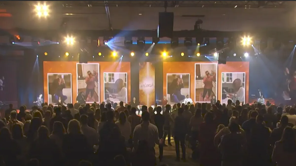 Guests enjoying professional dance entertainment at a corporate party